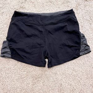 Women’s size small dri-fit spandex. Black and gray.